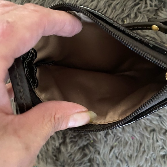 NWOT Coach wristlet with modern “C” on the traditional canvas gold material. - Picture 3 of 5